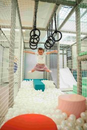 Pebble-Nest_girl_jumping_into_ba